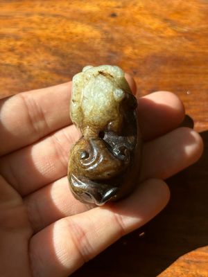 A Chinese celadon and russet jade mythical beast carving, Ming — photo 5