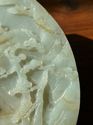 A Chinese celadon and russet jade plaque with landscape design, 19th C. — photo 16