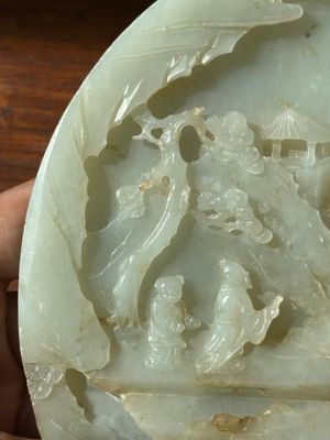 A Chinese celadon and russet jade plaque with landscape design, 19th C. — photo 17