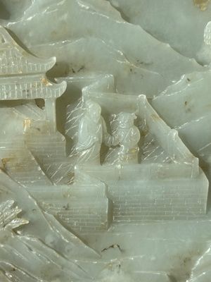 A Chinese celadon and russet jade plaque with landscape design, 19th C. — photo 2