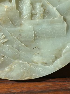 A Chinese celadon and russet jade plaque with landscape design, 19th C. — photo 8