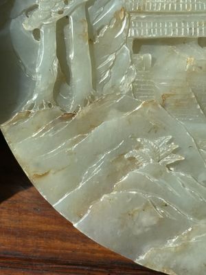 A Chinese celadon and russet jade plaque with landscape design, 19th C. — photo 9