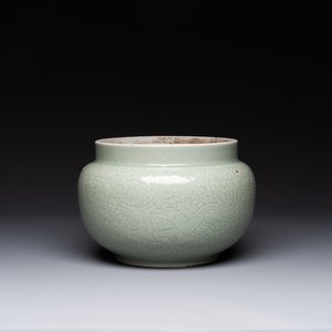 A Chinese celadon-glazed bowl with incised chilong among floral scrolls, Kangxi — photo 1