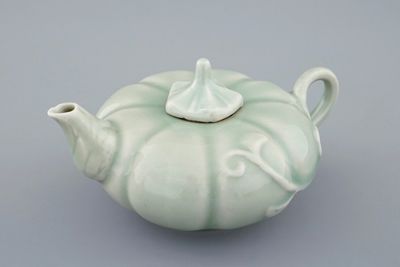 A Chinese celadon-glazed pumpkin shaped teapot and cover, 19/20th C.