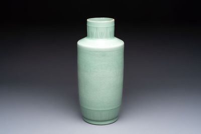 A Chinese celadon-glazed rouleau vase with incised floral design, 18th C.