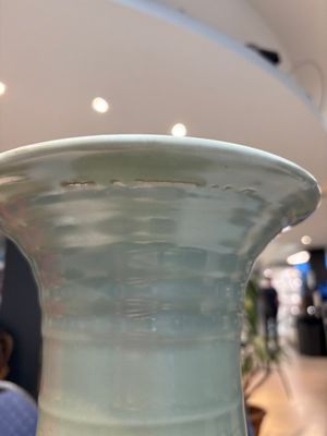 A Chinese celadon-glazed vase with relief lotus scroll design, 18th C. — photo 12