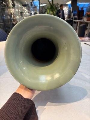A Chinese celadon-glazed vase with relief lotus scroll design, 18th C. — photo 5