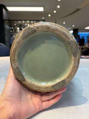 A Chinese celadon-glazed vase with relief lotus scroll design, 18th C. — photo 9