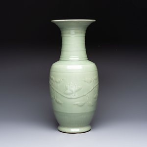 A Chinese celadon-glazed vase with relief lotus scroll design, 18th C. — photo 2