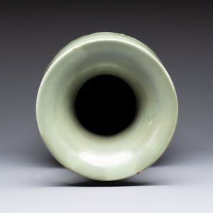 A Chinese celadon-glazed vase with relief lotus scroll design, 18th C. — photo 6