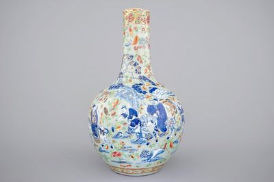A Chinese celadon-ground blue and white porcelain bottle-shaped vase with Cantonese overdecoration, 19th C.