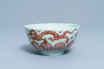 A Chinese celadon-ground copper red 'dragon' bowl, Kangxi