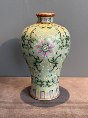 A Chinese celadon-ground famille rose 'meiping' 'flower scroll' vase, Qianlong mark and of the period — photo 1
