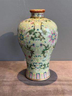 A Chinese celadon-ground famille rose 'meiping' 'flower scroll' vase, Qianlong mark and of the period — photo 2