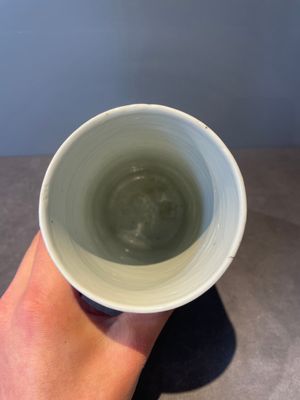 A Chinese celadon-ground slib design 'dragon' vase and Chinese blue and white vase or incense container, 19th C. — 照片 17
