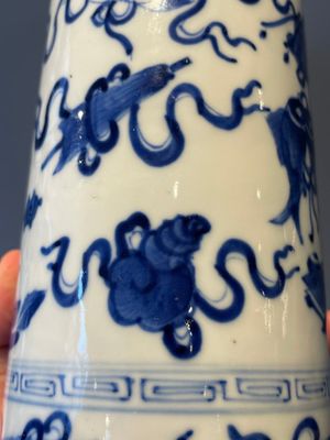 A Chinese celadon-ground slib design 'dragon' vase and Chinese blue and white vase or incense container, 19th C. — 照片 21