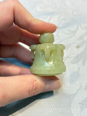 A Chinese celadon jade covered vase, with wooden stand, and a bowl with wooden cover and stand, 19/20th C. — photo 12