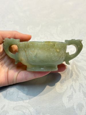A Chinese celadon jade covered vase, with wooden stand, and a bowl with wooden cover and stand, 19/20th C. — photo 22