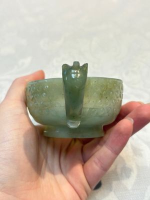 A Chinese celadon jade covered vase, with wooden stand, and a bowl with wooden cover and stand, 19/20th C. — photo 23