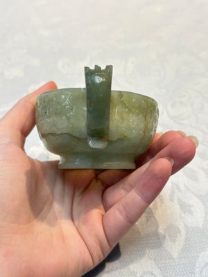 A Chinese celadon jade covered vase, with wooden stand, and a bowl with wooden cover and stand, 19/20th C. — photo 25