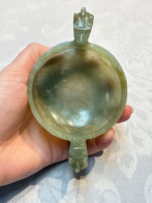 A Chinese celadon jade covered vase, with wooden stand, and a bowl with wooden cover and stand, 19/20th C. — photo 26