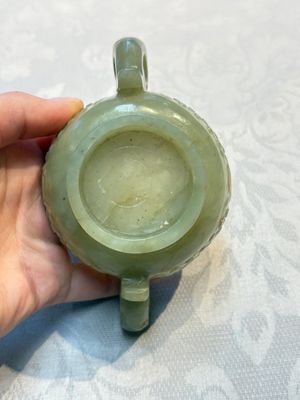 A Chinese celadon jade covered vase, with wooden stand, and a bowl with wooden cover and stand, 19/20th C. — photo 27