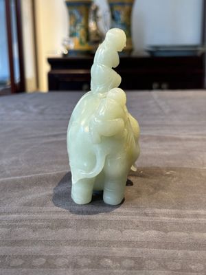 A Chinese celadon jade group of two boys cleansing an elephant, 18th C. — photo 2