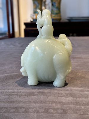A Chinese celadon jade group of two boys cleansing an elephant, 18th C. — photo 3