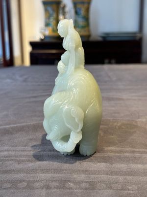A Chinese celadon jade group of two boys cleansing an elephant, 18th C. — photo 4
