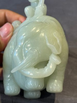 A Chinese celadon jade group of two boys cleansing an elephant, 18th C. — photo 7