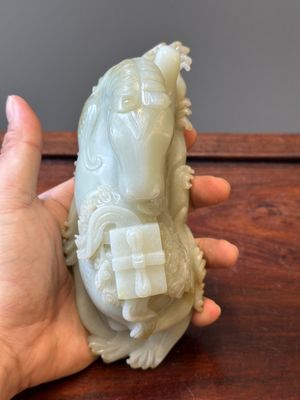 A Chinese celadon jade sculpture of a mythical horse, 18th C. — photo 6