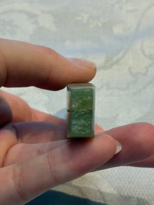 A Chinese celadon jade snuff bottle, a plaque and a ritual stick, Han and later — photo 13