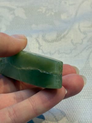 A Chinese celadon jade snuff bottle, a plaque and a ritual stick, Han and later — photo 14