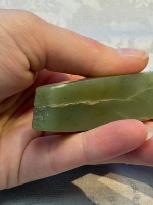 A Chinese celadon jade snuff bottle, a plaque and a ritual stick, Han and later — photo 15