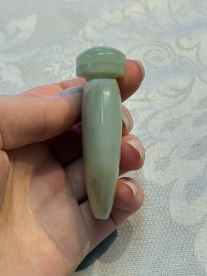 A Chinese celadon jade snuff bottle, a plaque and a ritual stick, Han and later — photo 17
