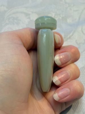 A Chinese celadon jade snuff bottle, a plaque and a ritual stick, Han and later — photo 19
