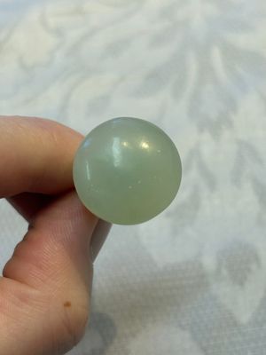 A Chinese celadon jade snuff bottle, a plaque and a ritual stick, Han and later — photo 31
