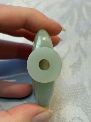 A Chinese celadon jade snuff bottle, a plaque and a ritual stick, Han and later — photo 32