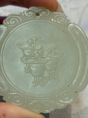 A Chinese celadon jade snuff bottle, a plaque and a ritual stick, Han and later — photo 4