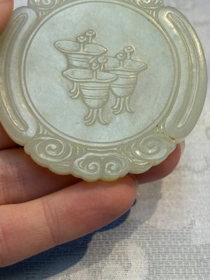A Chinese celadon jade snuff bottle, a plaque and a ritual stick, Han and later — photo 6