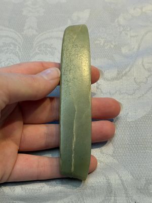 A Chinese celadon jade snuff bottle, a plaque and a ritual stick, Han and later — photo 7