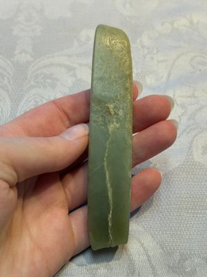A Chinese celadon jade snuff bottle, a plaque and a ritual stick, Han and later — photo 9