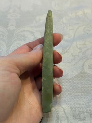 A Chinese celadon jade snuff bottle, a plaque and a ritual stick, Han and later — photo 10