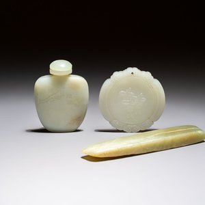A Chinese celadon jade snuff bottle, a plaque and a ritual stick, Han and later — photo 1