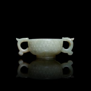 A Chinese celadon jade two-handled libation cup, Ming — photo 2