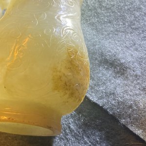 A Chinese celadon russet jade chilong-handled jug, Qing — 照片 19