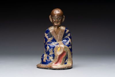 A Chinese champlevé figure of Luohan, Qianlong mark, 18/19th C.