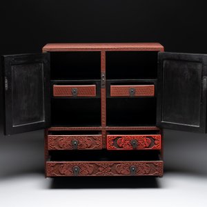 A Chinese cinnabar lacquer 'mountainous landscape' cabinet, 19th C. — photo 4