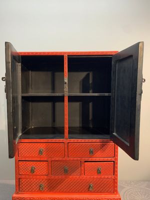 A Chinese cinnabar lacquer 'mountainous landscape' cabinet on a stand, 19th C. — photo 12