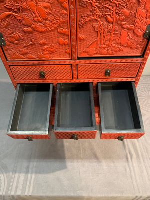 A Chinese cinnabar lacquer 'mountainous landscape' cabinet on a stand, 19th C. — photo 14